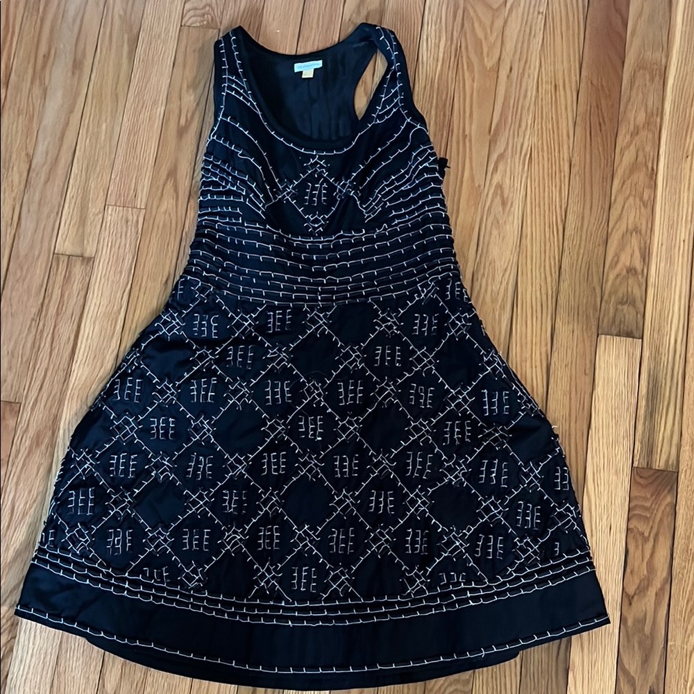 Lightweight black and white Leifsdottir racerback dress with brass buttons.